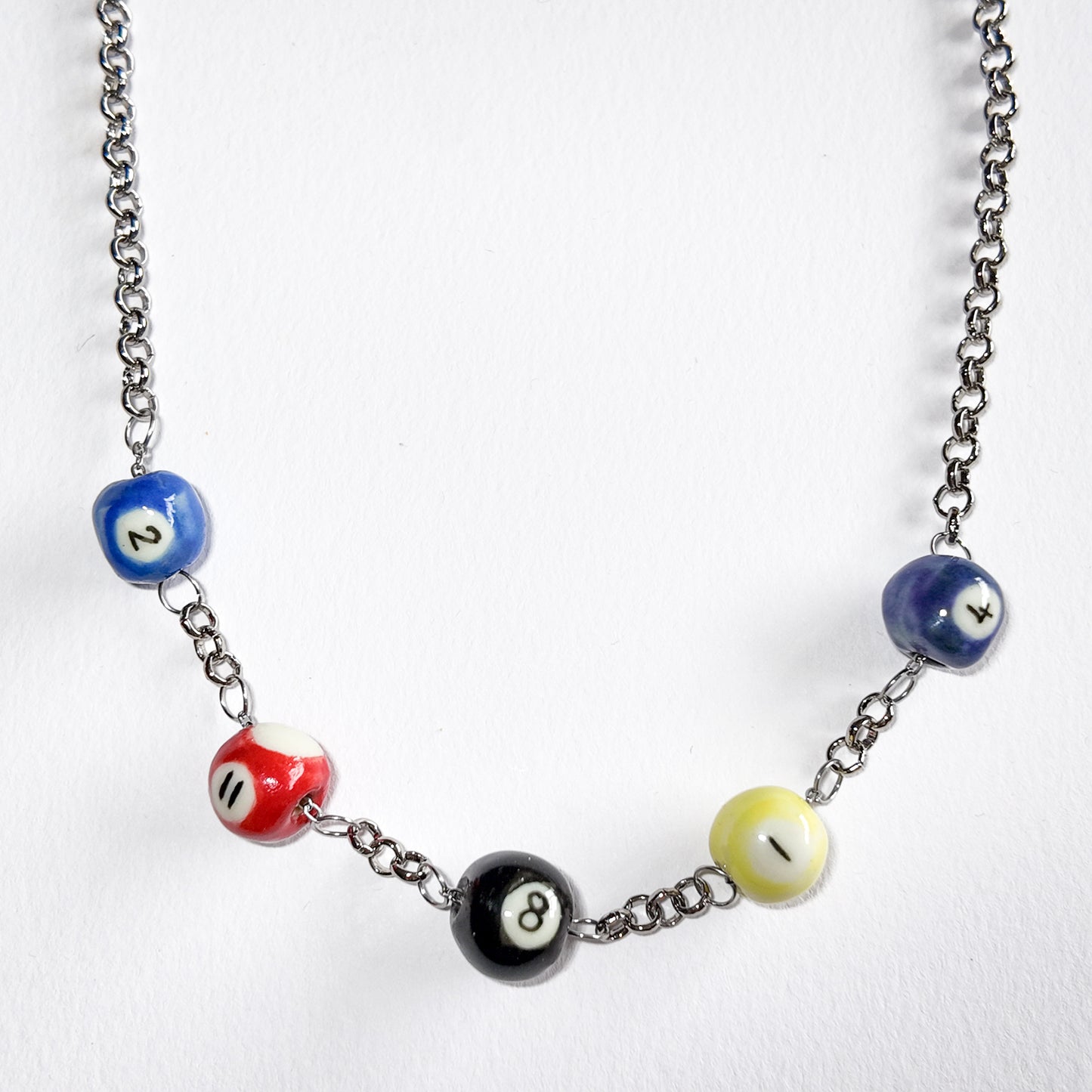 Silly billiard charm necklace